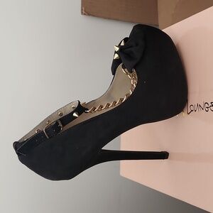 Black suede stud heels with bow